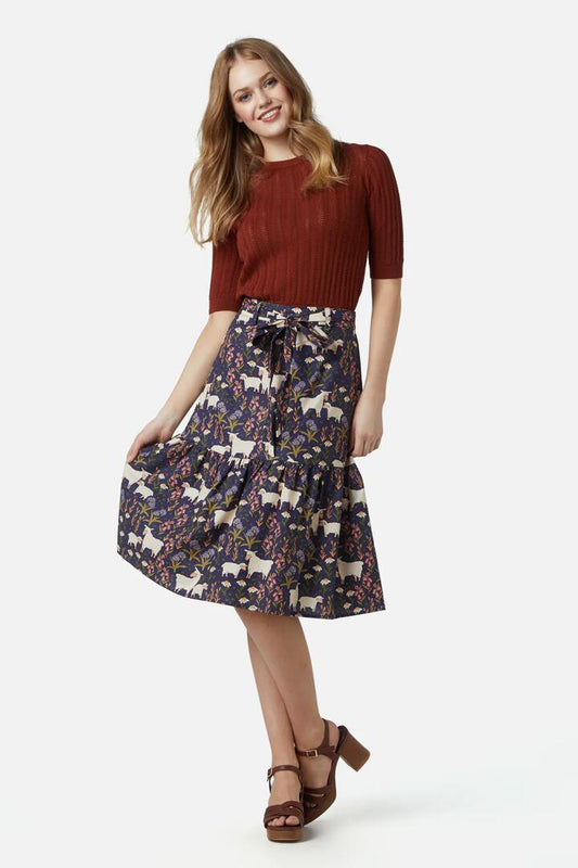 Image of a model wearing Skirts. Productname: Sheep And Flora Skirt in Navy colour by brand - Princess Highway