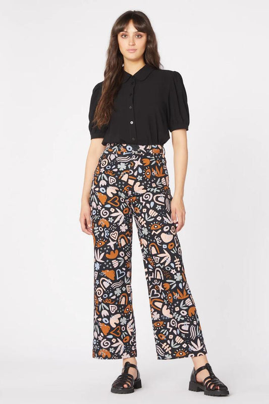 Image of a model wearing Denim. Productname: Arty Geo Printed Jean in Black colour by brand - Princess Highway