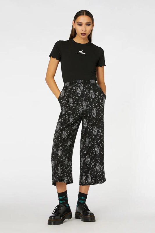 Image of a model wearing Pants. Productname: Read Into It Pant in Black colour by brand - Black Friday