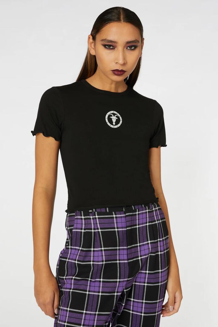 Image of a model wearing Tops. Productname: Capricorn Tee in Black colour by brand - Black Friday
