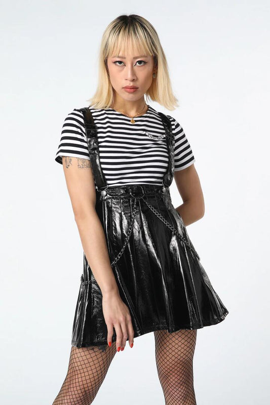 Image of a model wearing Dress. Productname: Grunge Pleated Pinny in Black colour by brand - Dangerfield
