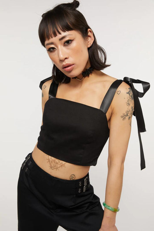 Image of a model wearing Tops. Productname: Romance Ribbon Strap Top in Black colour by brand - Dangerfield