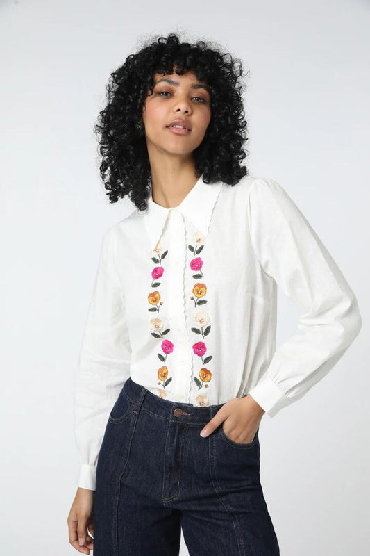Image of a model wearing Tops. Productname: Flower Patch Blouse in Cream colour by brand - Princess Highway