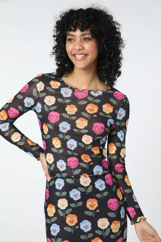 Image of a model wearing Tops. Productname: Pansy Mesh Top in Black colour by brand - Princess Highway