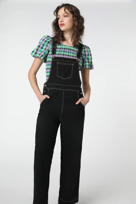 Image of a model wearing Pants. Productname: Paige Overall in Black colour by brand - Princess Highway