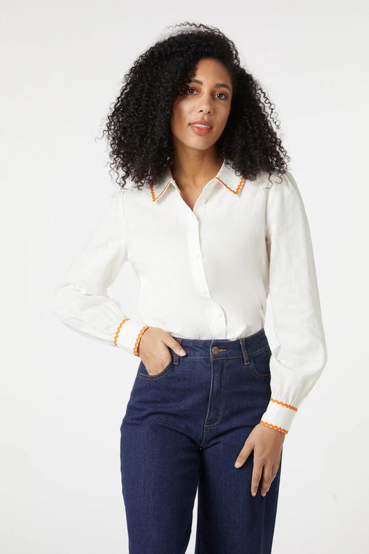 Image of a model wearing Tops. Productname: Megan Blouse in Cream colour by brand - Princess Highway