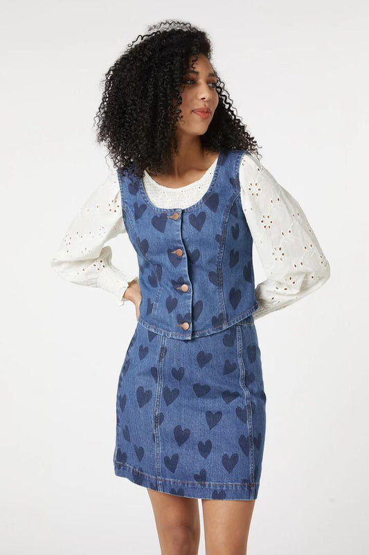 Image of a model wearing Tops. Productname: Indigo Hearts Vest in Denim colour by brand - Princess Highway