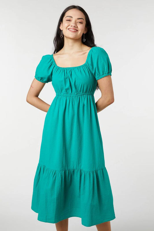 Image of a model wearing Dress. Productname: Belle Midi Dress in Green colour by brand - Princess Highway
