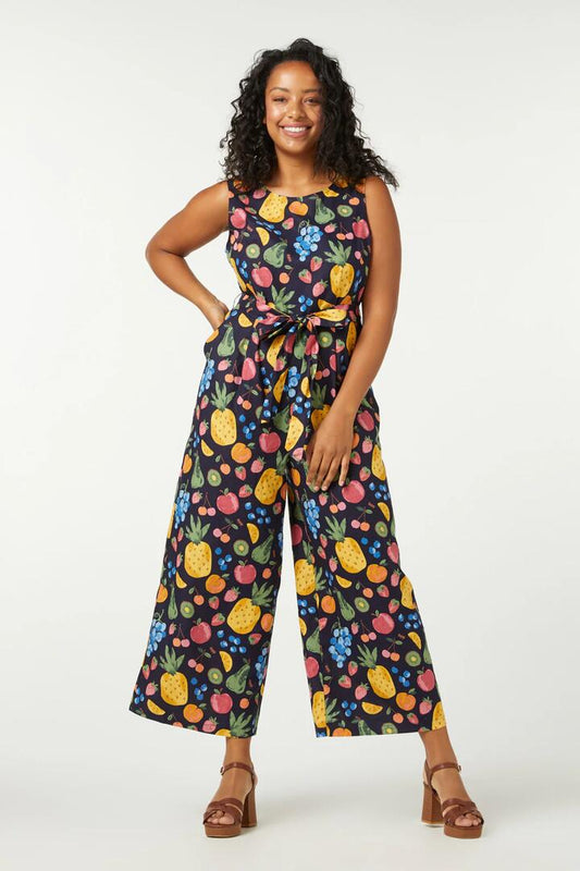 Image of a model wearing Outerwear. Productname: Summer Fruits Jumpsuit in Navy colour by brand - Princess Highway
