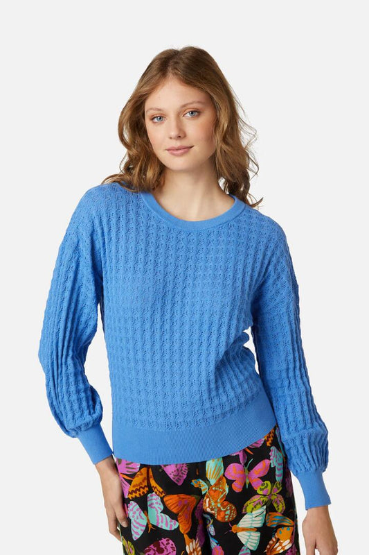Image of a model wearing Outerwear. Productname: Stella Sweater in Blue colour by brand - Princess Highway