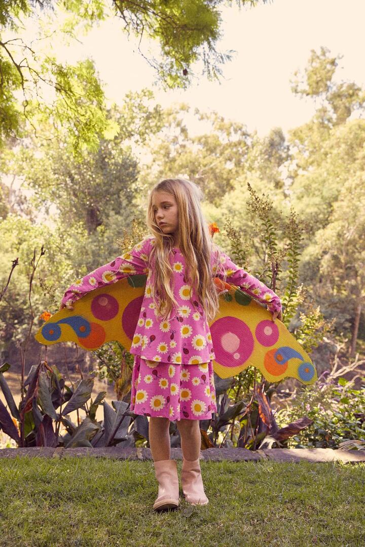 Image of a model wearing Tops. Product name - Daisy Ladybird Kids Jersey Drs in Pink colour by brand - Princess Highway Kids