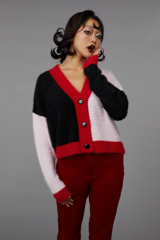 Image of a model wearing Outerwear. Productname: Spirits Cardigan in Pink/Black colour by brand - Black Friday