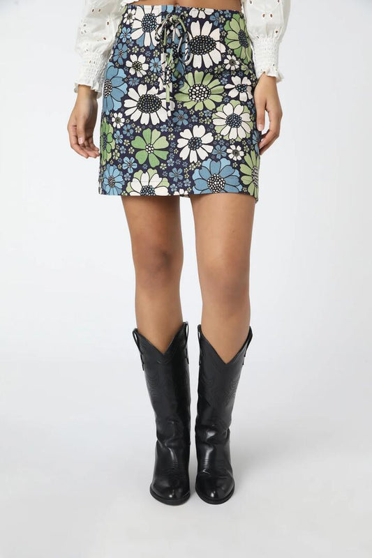 Image of a model wearing Skirts. Productname: Marigold Mini Skirt in Blue colour by brand - Princess Highway