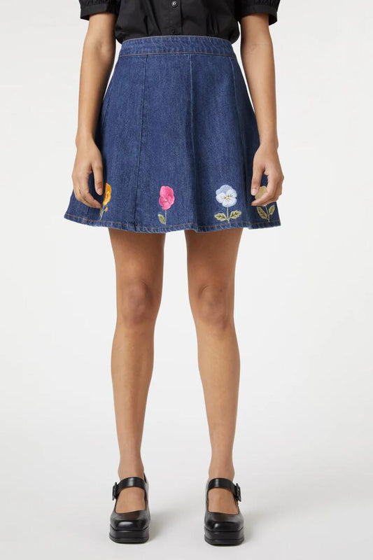 Image of a model wearing Skirts. Productname: Flower Patch Skirt in Mid Denim colour by brand - Princess Highway