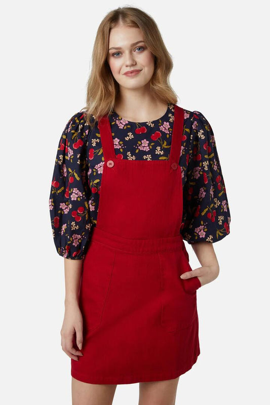 Image of a model wearing Dress. Productname: Holly Drill Pinny in Navy colour by brand - Princess Highway