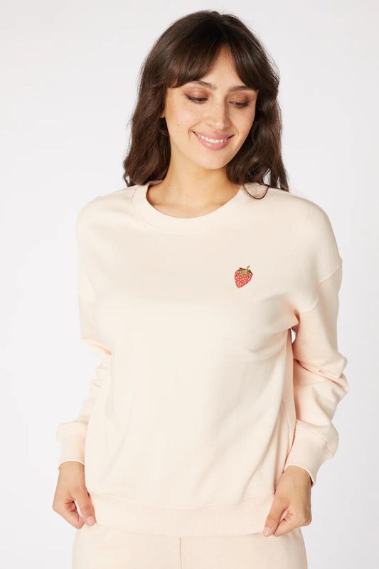 Image of a model wearing Outerwear. Productname: Giselle Track Sweater in Blush colour by brand - Princess Highway