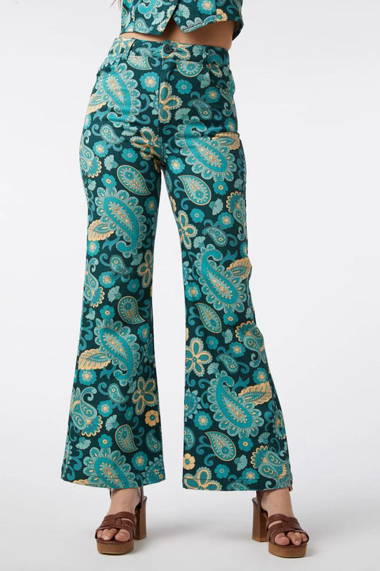 Image of a model wearing Denim. Productname: Sunset Paisley Flare Jean in Green colour by brand - Princess Highway