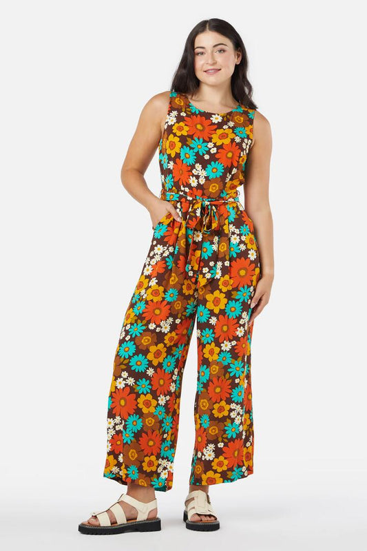 Image of a model wearing Outerwear. Productname: Pattie Floral Jumpsuit in Chocolate colour by brand - Princess Highway