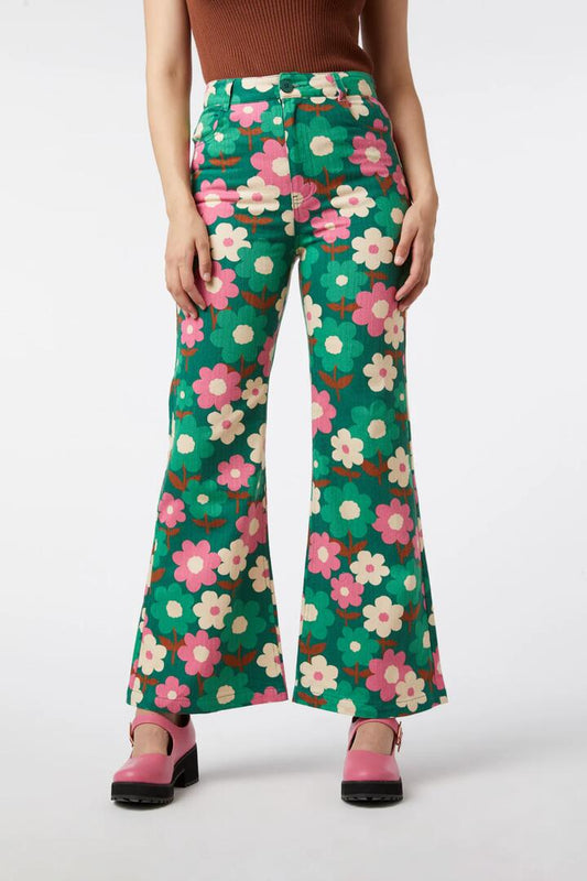Image of a model wearing Denim. Productname: Renee Floral Flare Jean in Green colour by brand - Princess Highway