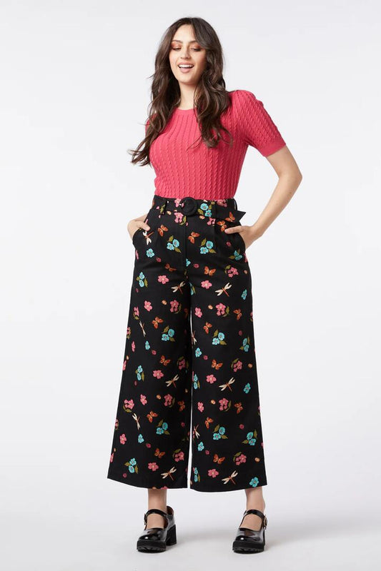 Image of a model wearing Pants. Productname: Serena Flora Pant in Black colour by brand - Princess Highway