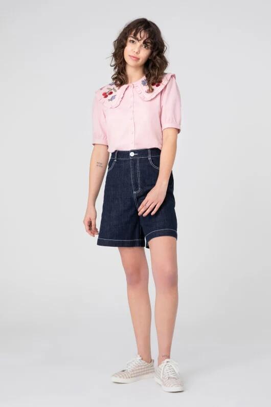 Image of a model wearing Denim. Productname: Cherry Denim Shorts in Dark Denim colour by brand - Princess Highway