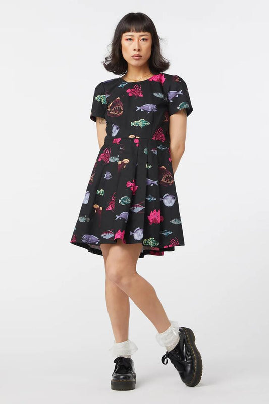 Image of a model wearing Dress. Productname: Deep Sea Pleated Dress in Black colour by brand - Dangerfield