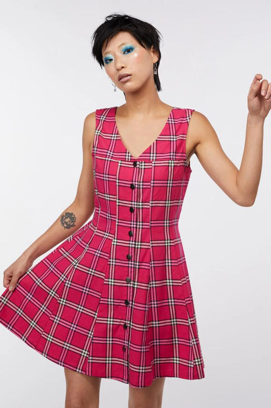 Image of a model wearing Dress. Productname: Tartan Button Up Pinafore in Pink colour by brand - Dangerfield