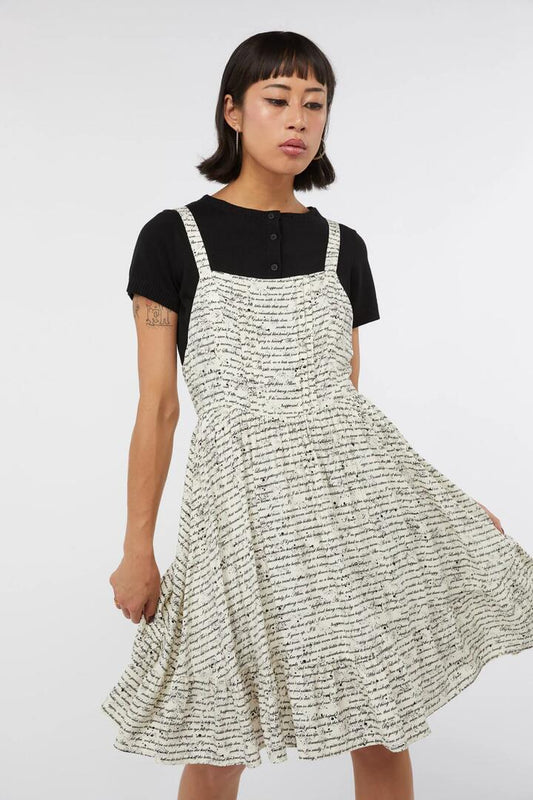 Image of a model wearing Dress. Productname: Read It Again Pinafore in Blue colour by brand - Dangerfield