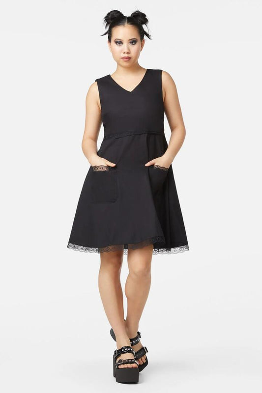 Image of a model wearing Dress. Productname: Very Late Pinafore in Black colour by brand - Dangerfield
