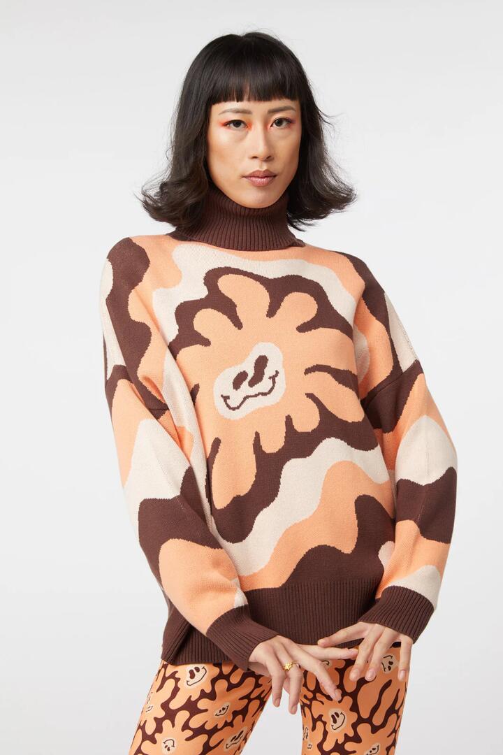 Image of a model wearing Tops. Productname: Flower Frenzy Knit in Brown colour by brand - Dangerfield