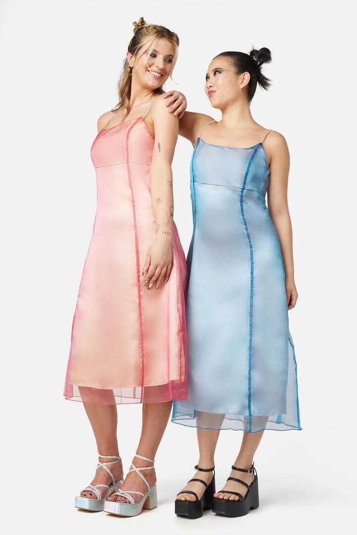 Image of a model wearing Dress. Productname: Holographic Sheer Dress in Orange colour by brand - Dangerfield