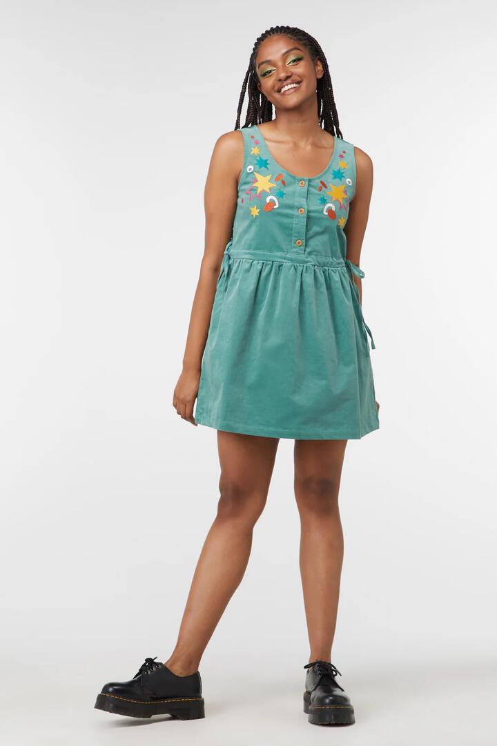 Image of a model wearing Dress. Productname: Bianca Pinafore in Teal colour by brand - Dangerfield