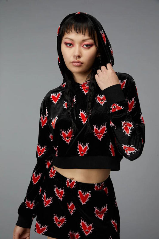 Image of a model wearing Outerwear. Productname: Flamin Hearts Velour Hoodie in Black colour by brand - Black Friday