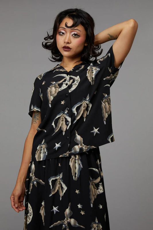 Image of a model wearing Tops. Productname: Pierrot Blouse in Black colour by brand - Black Friday