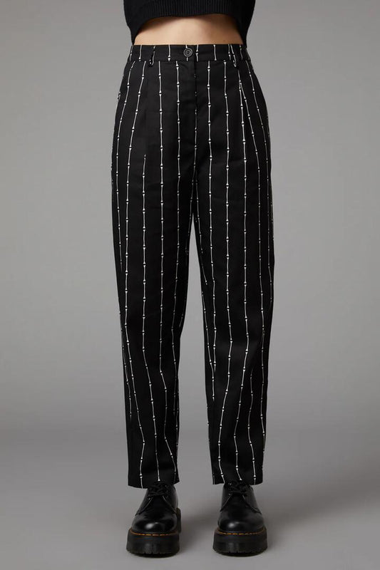 Image of a model wearing Pants. Productname: Funny Bone Pant in Black colour by brand - Black Friday