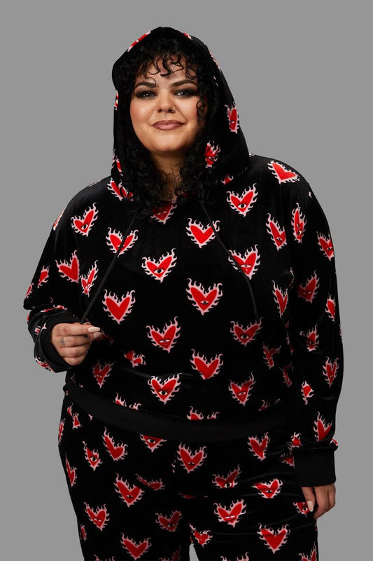 Image of a model wearing Outerwear. Productname: Curve Flamin Hearts Velour Hoodie in Black colour by brand - Black Friday