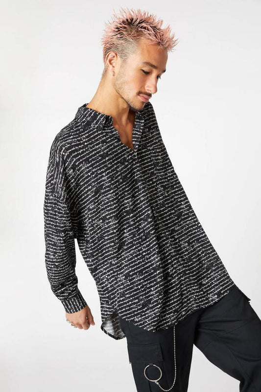 Image of a model wearing Tops. Productname: Read It Again Long Sleeve Shirt in Cream colour by brand - Dangerfield