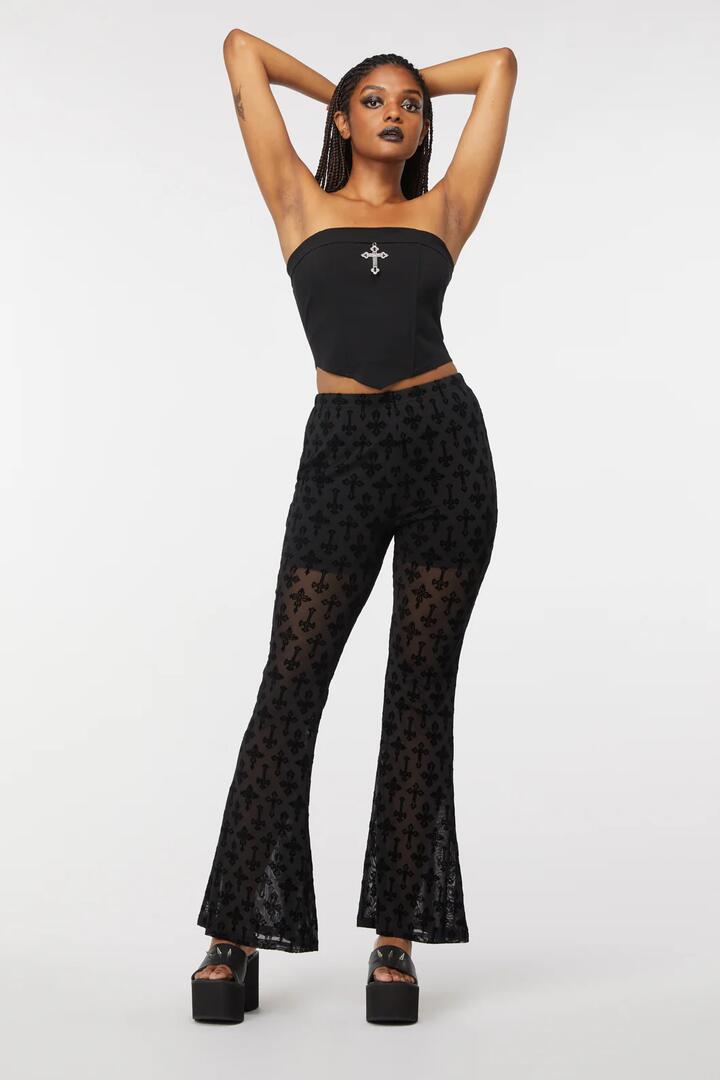 Image of a model wearing Pants. Productname: Crucifix Mesh Pants in Black colour by brand - Dangerfield