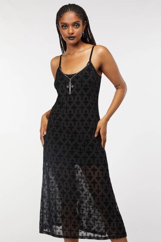 Image of a model wearing Dress. Productname: Crucifix Mesh Slip Dress in Black colour by brand - Dangerfield