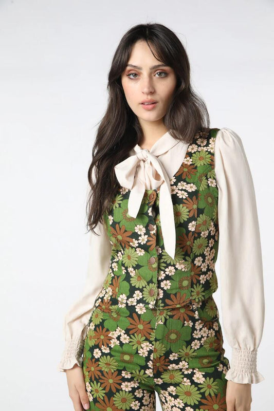 Image of a model wearing Tops. Productname: Bridgette Vest in Green colour by brand - Princess Highway