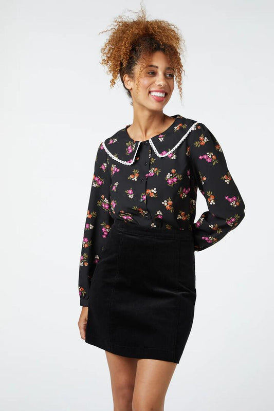 Image of a model wearing Tops. Productname: Charlotte Blouse in Black colour by brand - Princess Highway