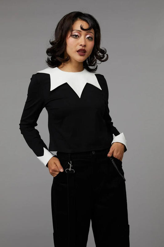 Image of a model wearing Tops. Productname: Clowning Around Top in Black colour by brand - Black Friday