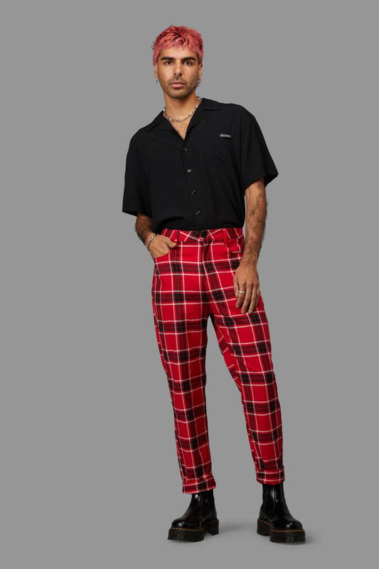 Image of a model wearing Pants. Productname: Demonic Unisex Tartan Pant in Red colour by brand - Black Friday