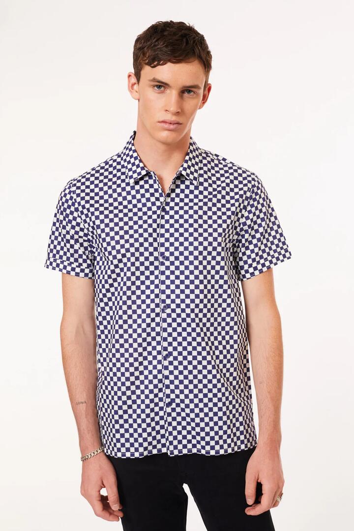 Image of a model wearing Tops. Productname: Blowout SS Shirt in Navy/White colour by brand - Dangerfield