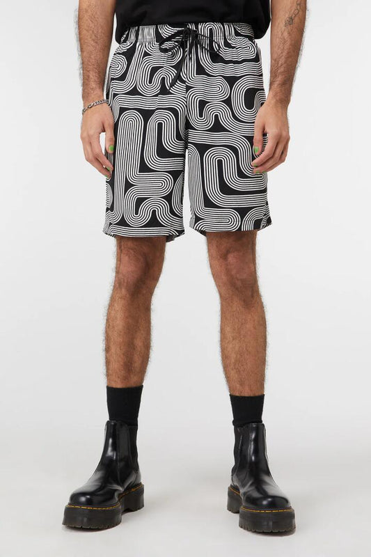 Image of a model wearing Shorts. Productname: Geo Print Trunks in Black colour by brand - Dangerfield