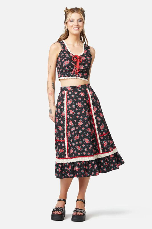 Image of a model wearing Tops. Productname: 70s Prairie Rose Bustier Top in Black colour by brand - Revival