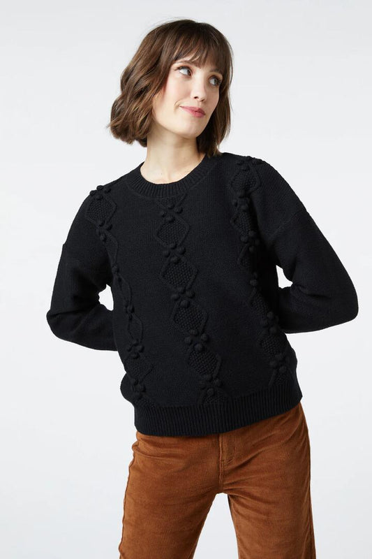Image of a model wearing Outerwear. Productname: Mila Sweater in Black colour by brand - Princess Highway