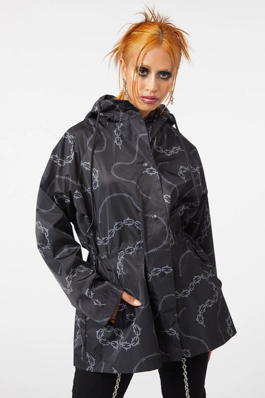Image of a model wearing Rain Coats. Productname: Bound & Chained Raincoat in Black colour by brand - Dangerfield