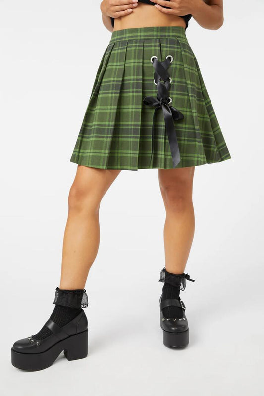 Image of a model wearing Skirts. Productname: Meadow Tartan Skort in Olive colour by brand - Dangerfield