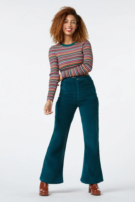 Image of a model wearing Denim. Productname: Evie Flare Jean in Toffee colour by brand - Princess Highway